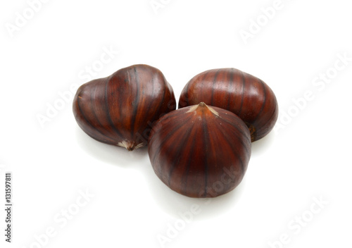 Fresh chestnuts isolated on white background