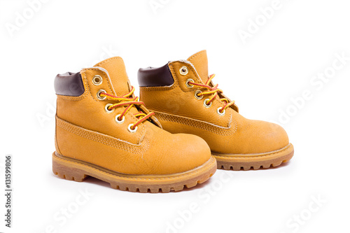 Yellow boots isolated on white background