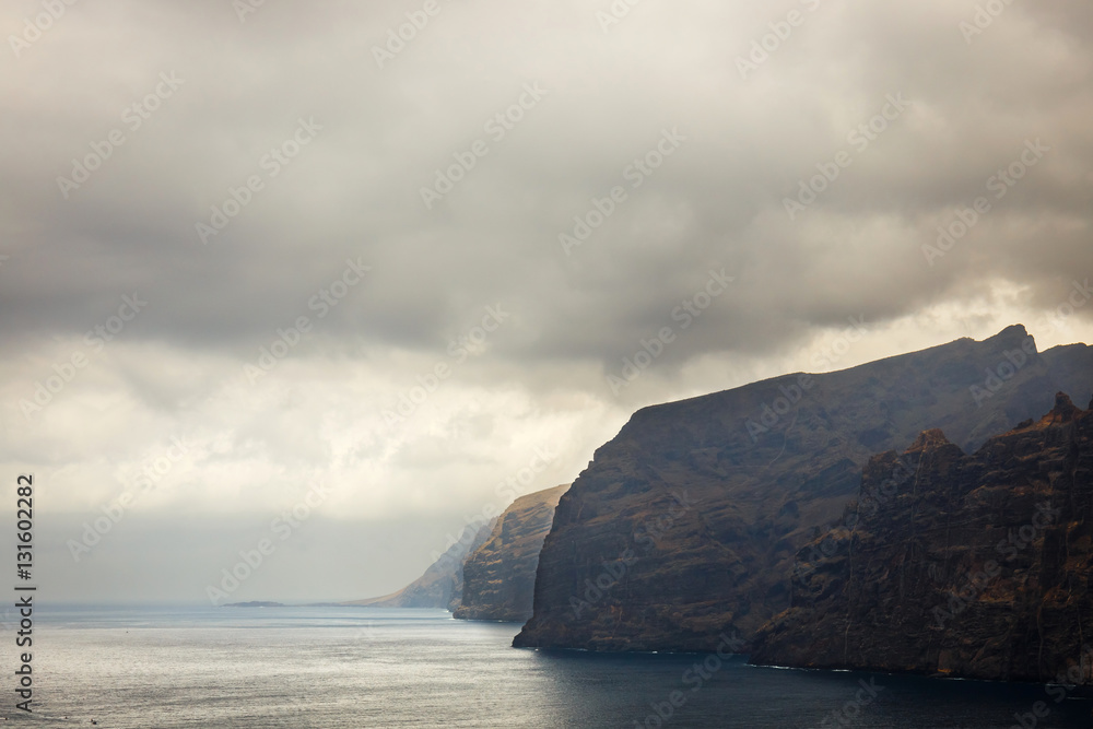 view of the cloudy cliffs of Los Gigantes in Tenerife, Canary Islands, Spain view of the cloudy cliffs of Los Gigantes in Tenerife, Canary Islands, Spain