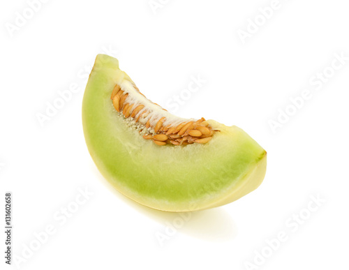 sliced honeydew melon isolated on white background