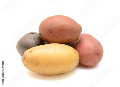 Mixed varieties of potatoes  red potatoes  yellow potatoes and purple potatoes