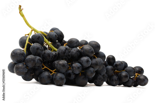 Obraz na plátne bunch of black grapes isolated on white background