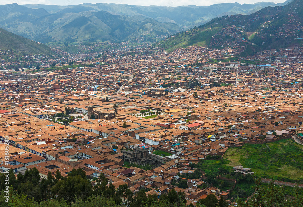Cityscape of Cusco in Sacred Valley, Peru. A view from a fortress Saksaywaman (UNESCO World Heritage Site)