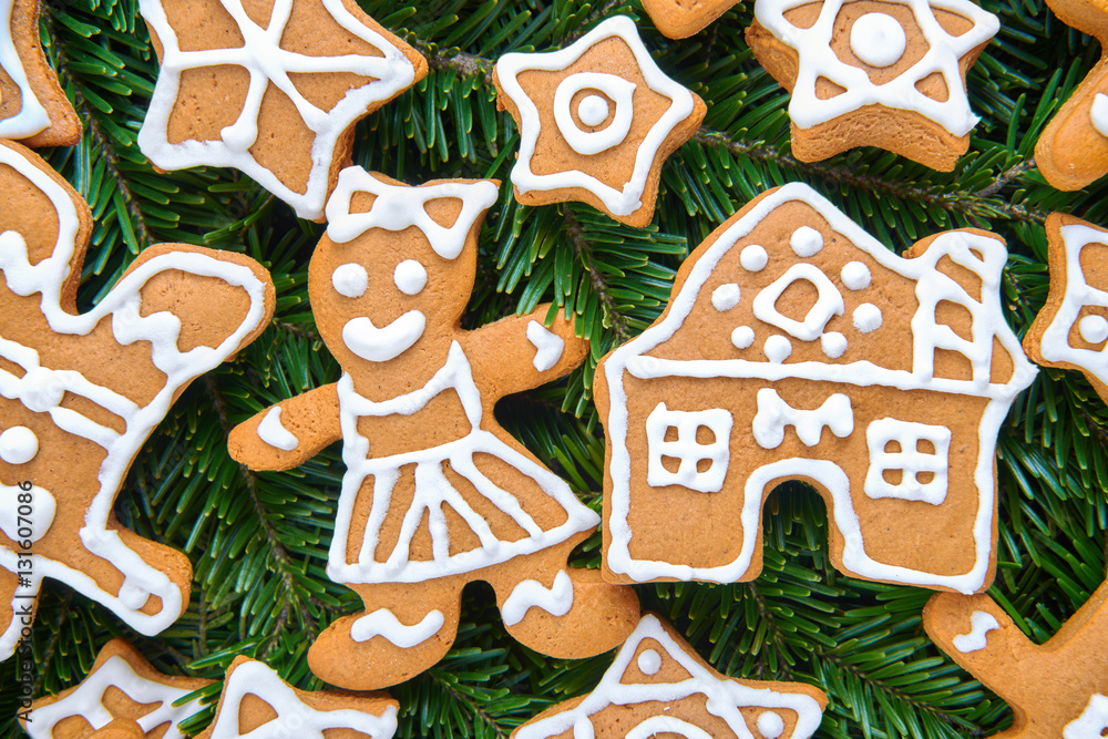 Various types of homemade gingerbread on a Christmas tree branch