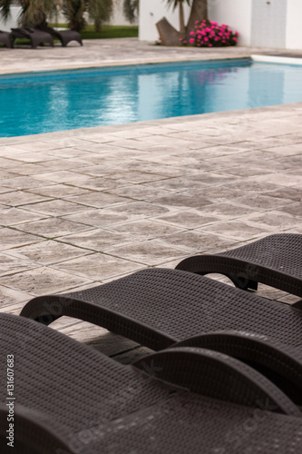 Swimming pool chairs on hotel