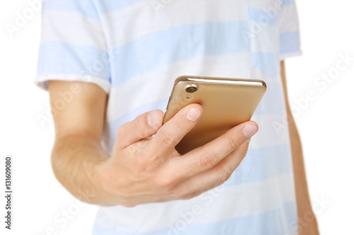 Man holding smart phone, closeup