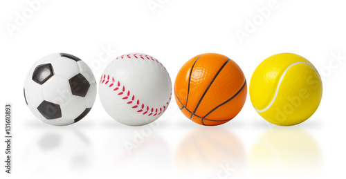 4 small sports balls isolated over white