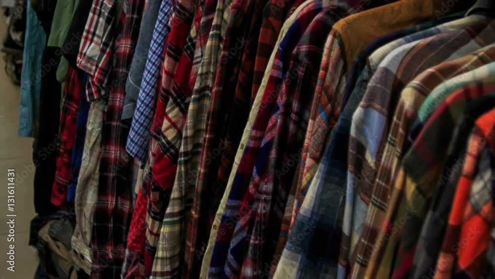 View of Racks with Colorful Women Clothes in Shop View of Racks with Colorful Women Clothes in Shop