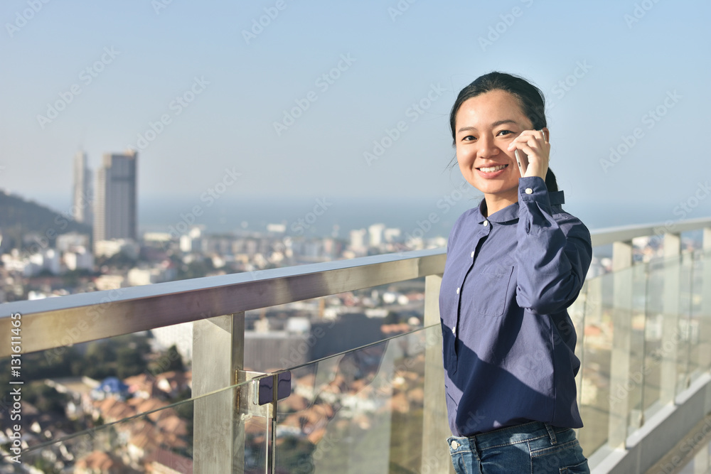 Business woman using smartphone. Urban background Business woman using smartphone. Urban background