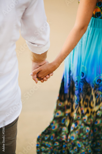 lovely couple holding hands together