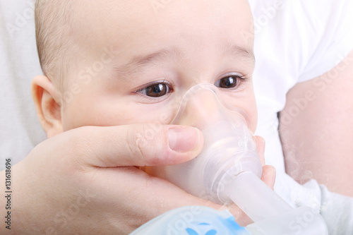 Baby boy at the hospital gets inhaler treatment for cough