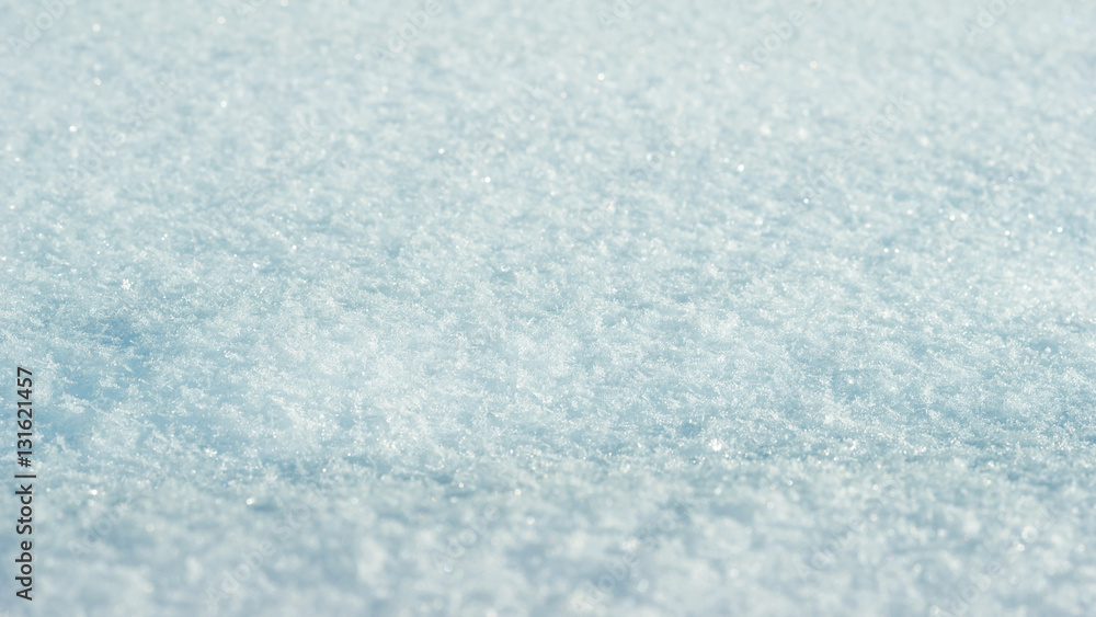 Obraz premium White blue Glitter bokeh from snow texture background