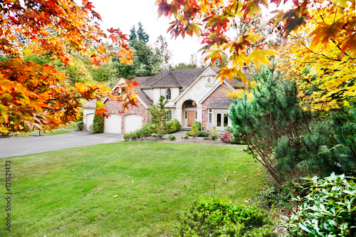 Suburban home in early Autumn as the leaves begin to turn