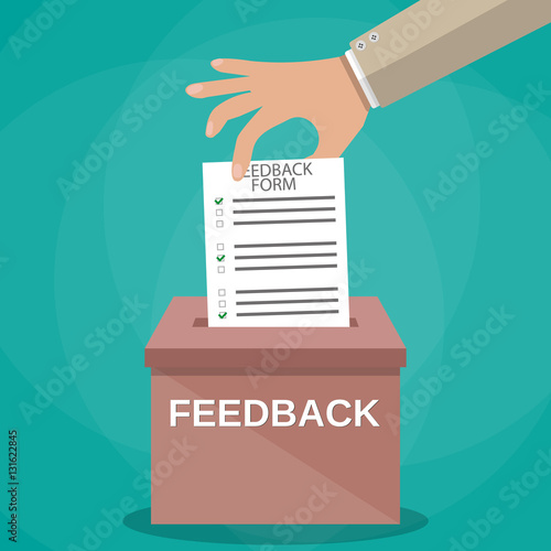 Hand putting paper in feedback box