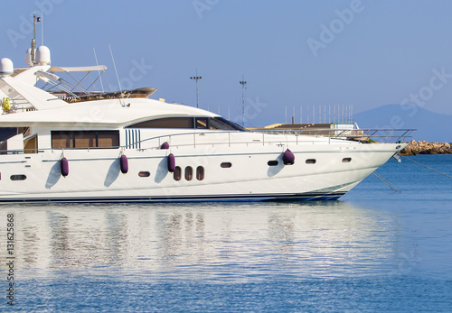large white modern motor superyacht in the port city of Rhodes Greece © vladimircaribb