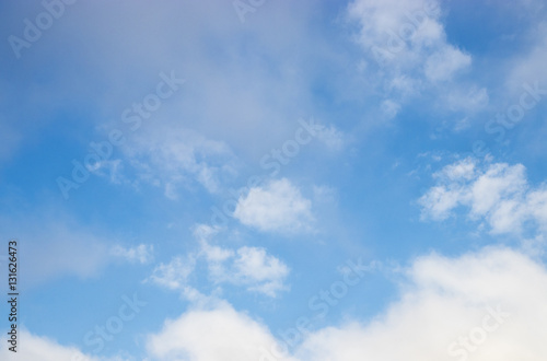 blue sky with clouds and fog