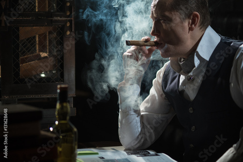the man took out a cigar from the humidor