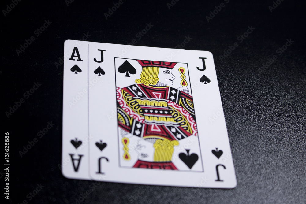 black jack poker card on dark black background