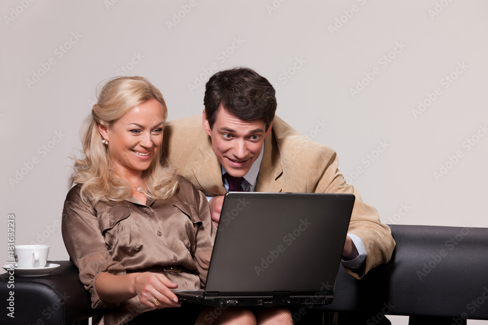 Young Woman And Man with a notebook Young Woman And Man with a notebook