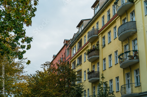 Colorful townhouses with semi-circular balconies