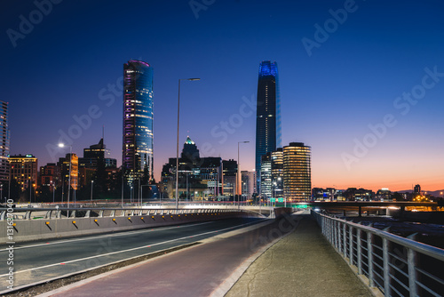 Beautiful view to road and illuminated skyscrapers in Santiago  Chile. Horizontal outdoors shot