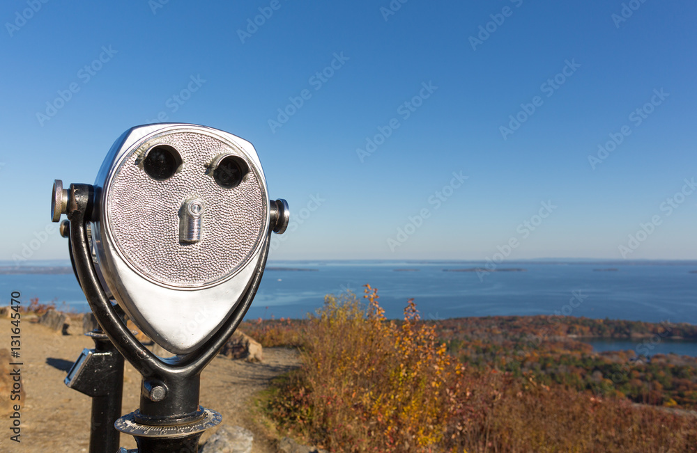 Coin operated binoculars above Camden Maine in the late fall.