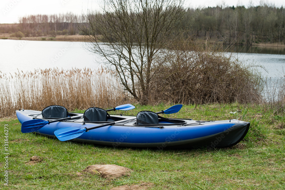 Inflatable kayak near water