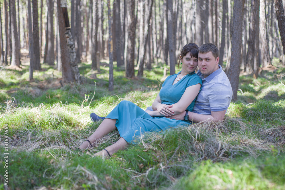 Loving couple resting on the nature. Loving couple resting on the nature.