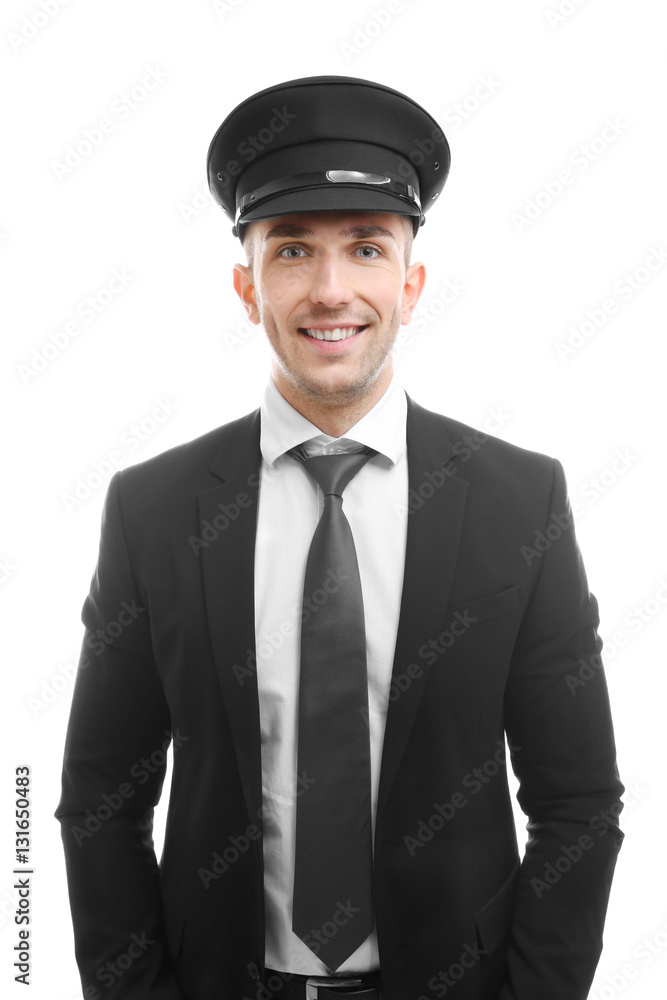 Young chauffeur standing on white background Young chauffeur standing on white background