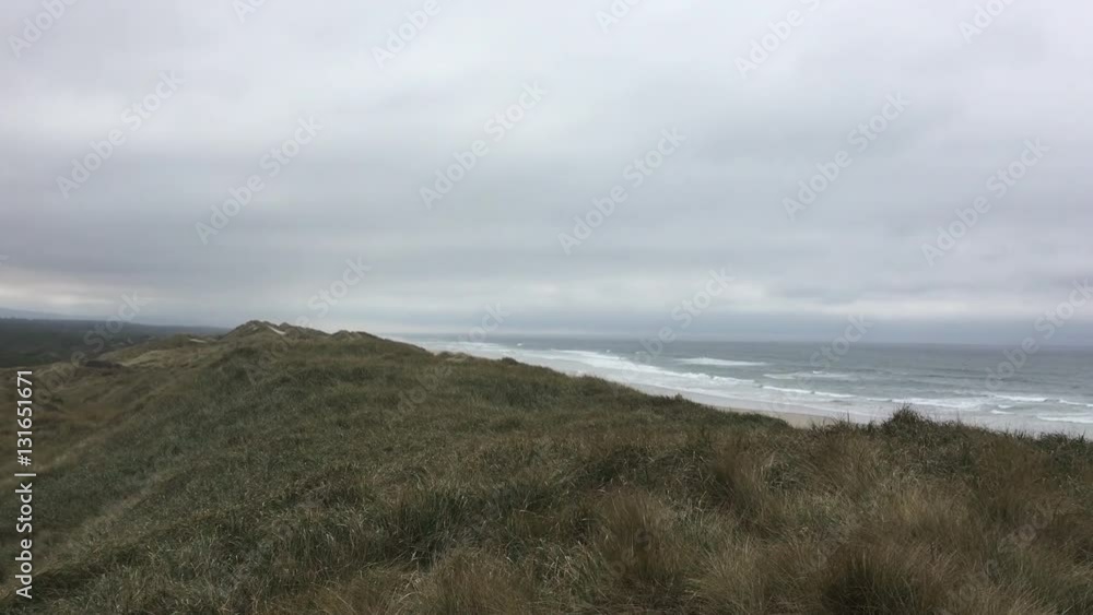 Thick clouds over South Jetty Beach Oregon Coast USA Thick clouds over South Jetty Beach Oregon Coast USA