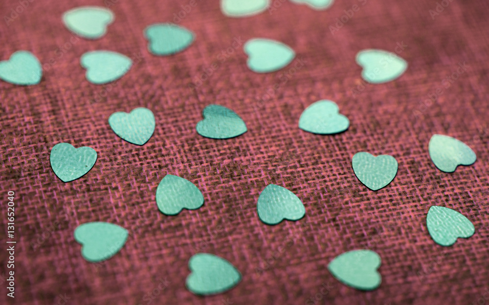 Macro Glitter Hearts on Fabric Background for Valentine Macro Glitter Hearts on Fabric Background for Valentine