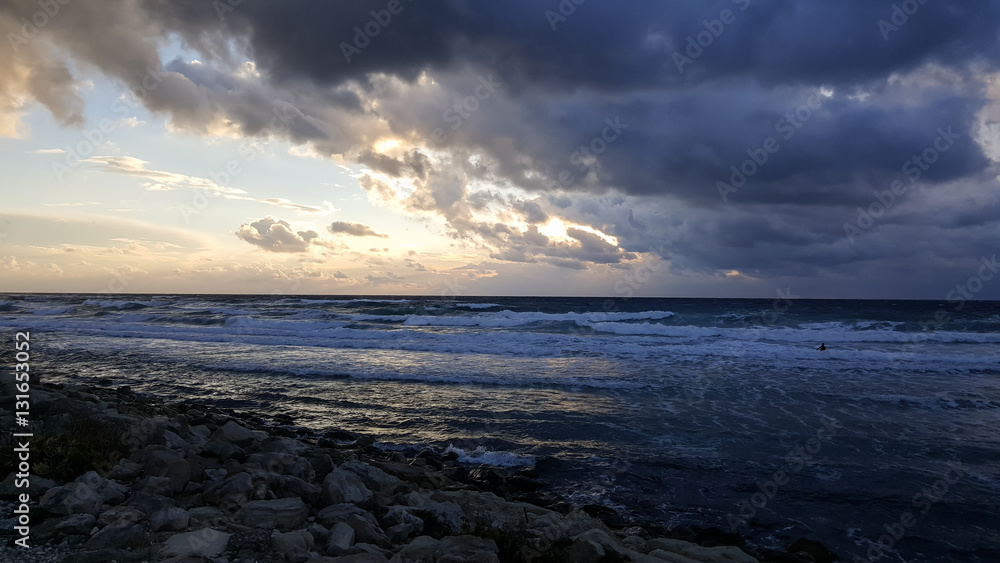 Sunset, on promenade of Mediterranean Sea, winter, Haifa, Israel