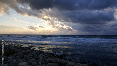 Sunset, on promenade of Mediterranean Sea, winter, Haifa, Israel