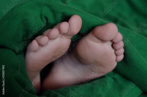 Feet Wrapped in Warm Blanket © Lane Erickson