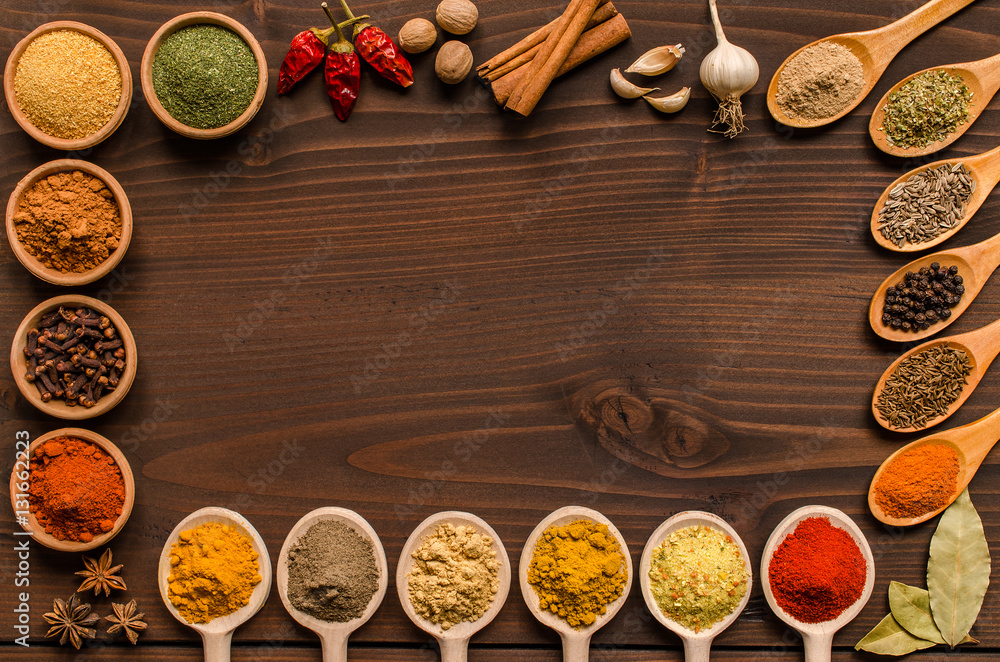 Indian spices and dried herbs background- Top view Indian spices and dried herbs background- Top view