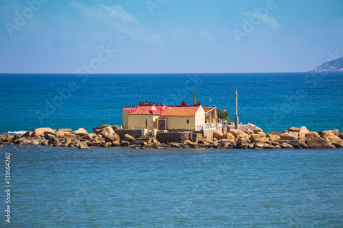 Buddhist temple on the island © Oleg Zhukov