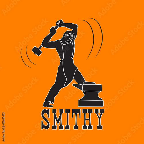 Byuschy blacksmith on the anvil with a hammer.
