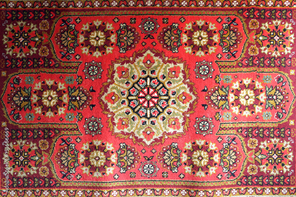 old carpet with national oriental pattern