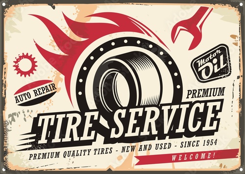 Vintage tin sign for tire service with tire drawing and speed flames