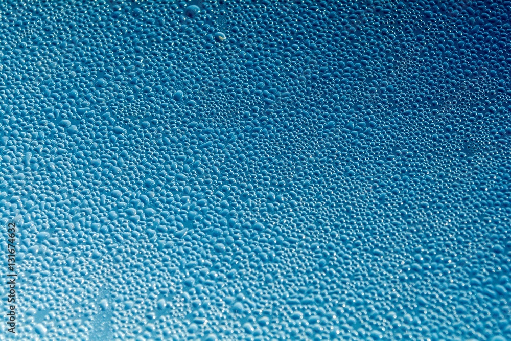 Clear window glass. On the window glass are raindrops.
Clear window glass. On the window glass are raindrops.