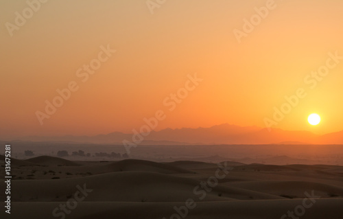 Hot sunrise in the desert dunes of Dubai  United Arab Emirates.