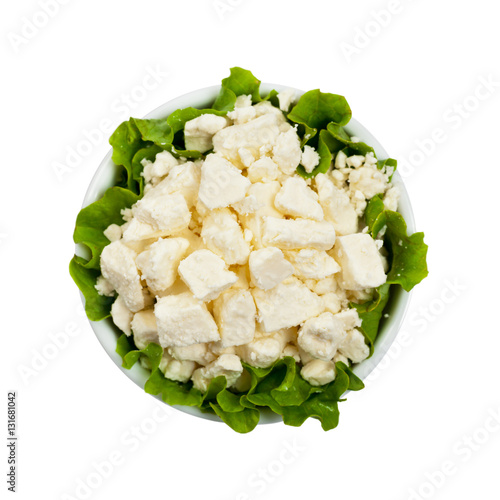 Feta Crumbled Cheese Isolated on White. Selective focus.