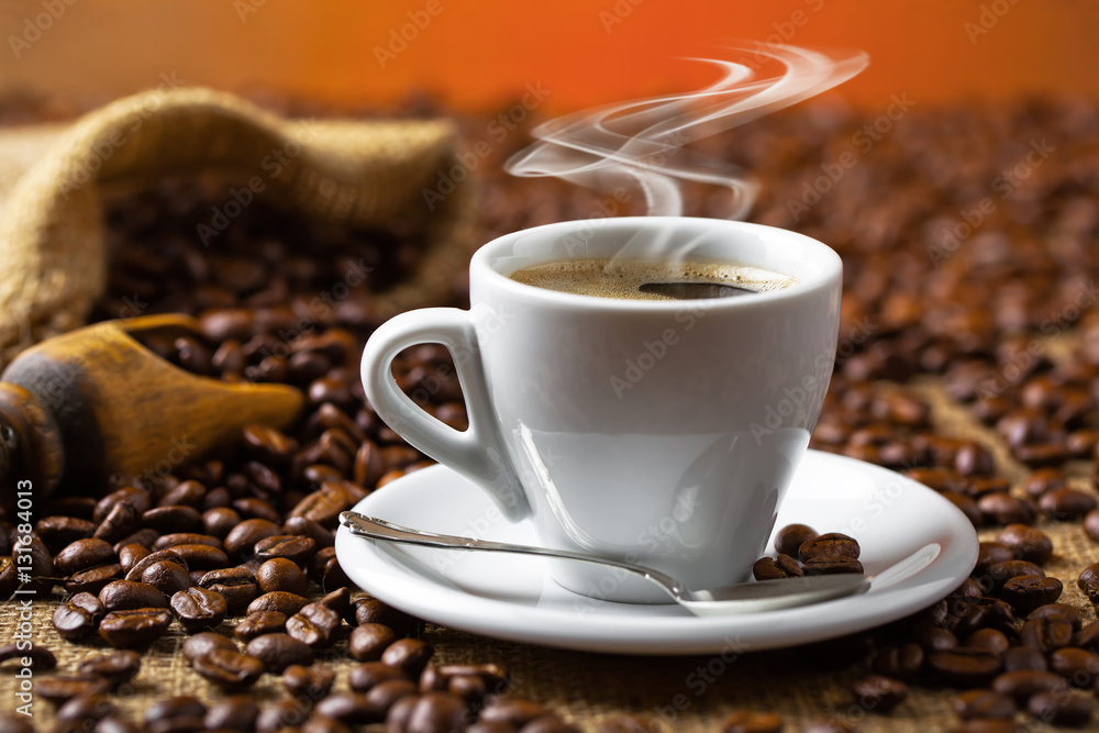 Fototapeta premium Black coffee on old background