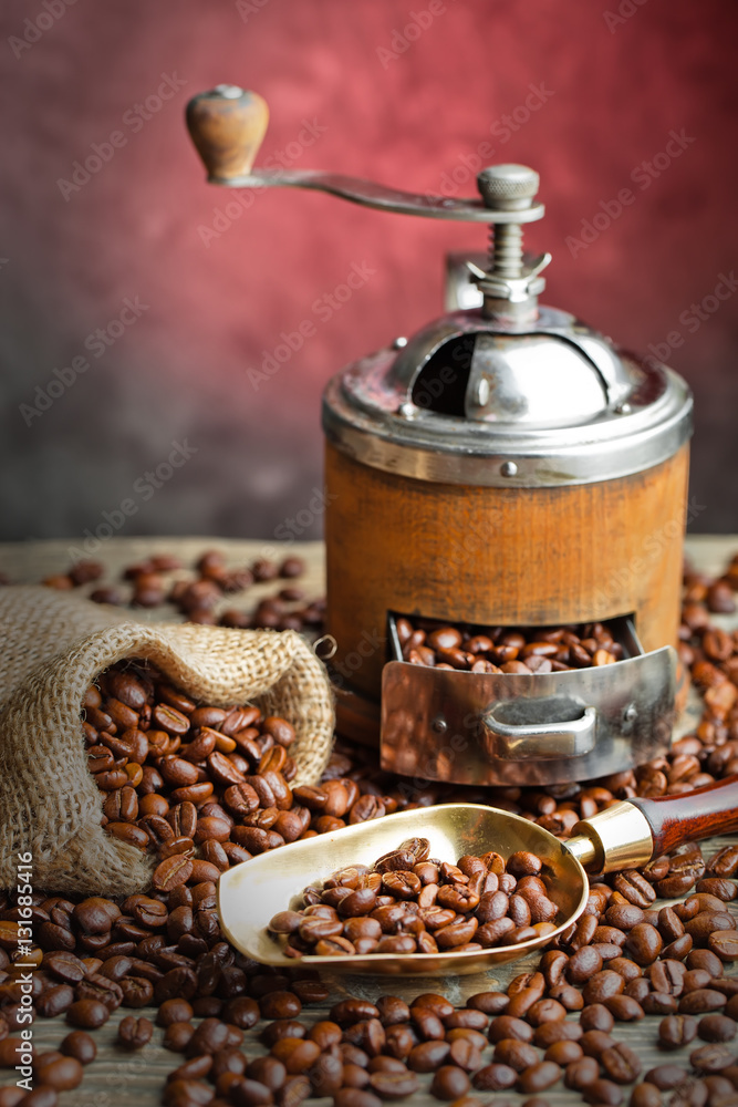 Black coffee in a cup on old background