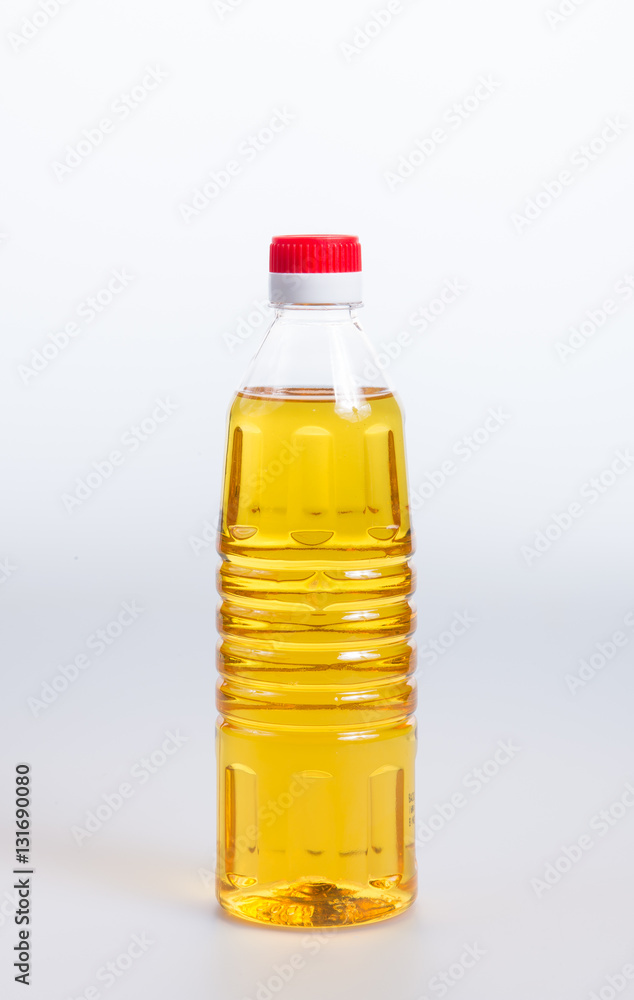 oil or oil in plastic bottle on the background. oil or oil in plastic bottle on the background.