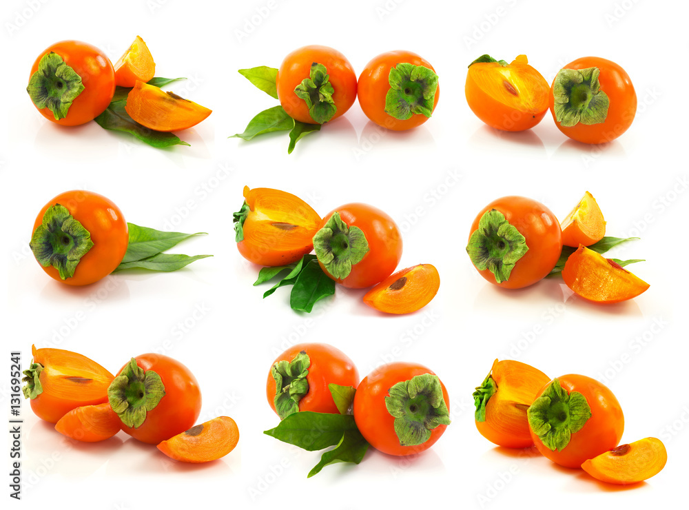 Set of ripe fresh persimmons with slices and leaves Set of ripe fresh persimmons with slices and leaves