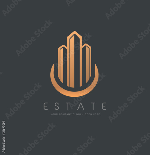 Real Estate Logo with tree buildings and simple gold design.