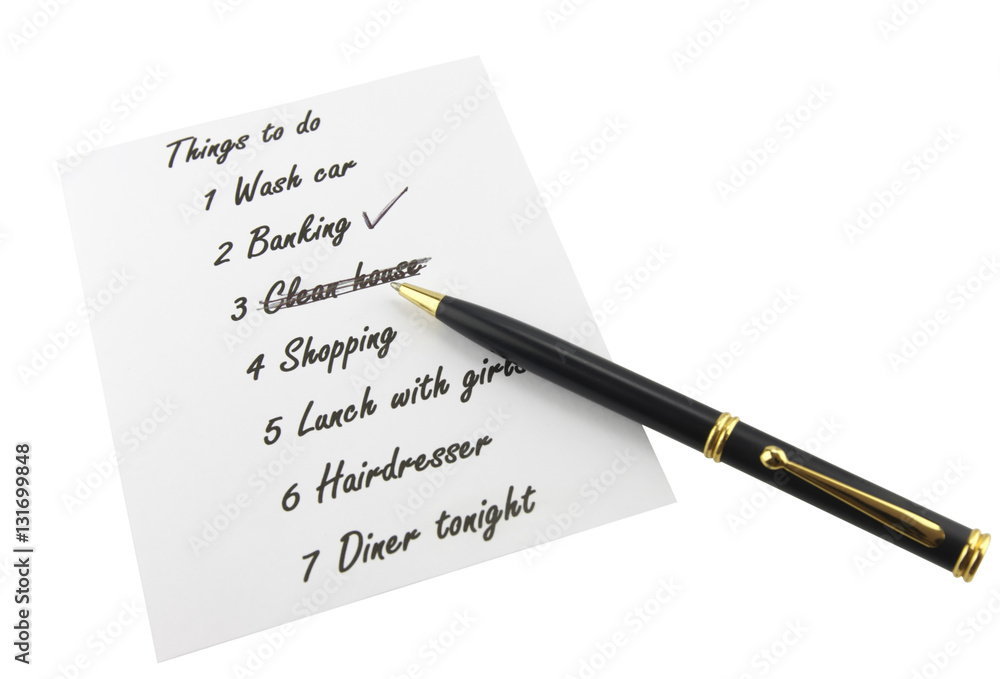 List with things to do and a pen List with things to do and a pen