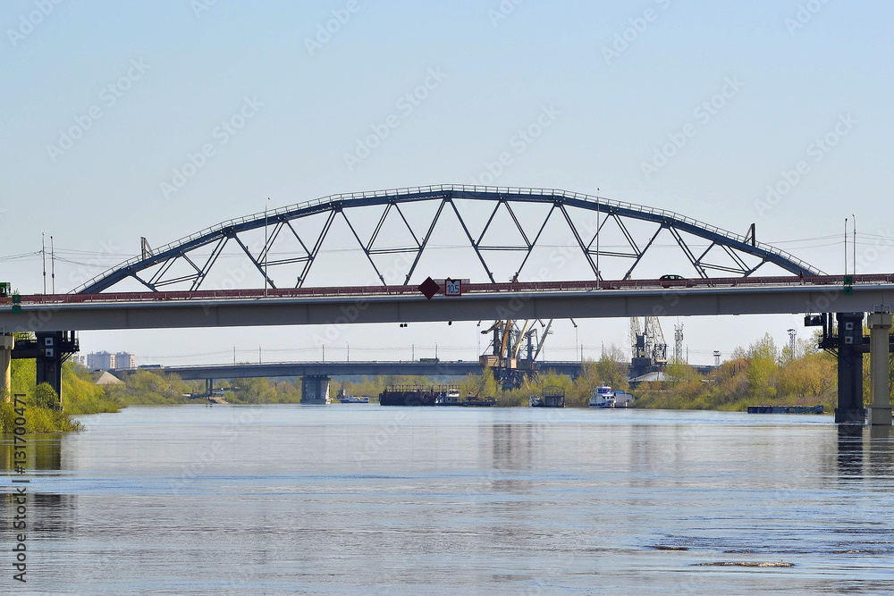 Two bridges through the Tura River in Tyumen, Russia.