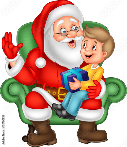 Santa Claus sitting with a little cute boy

